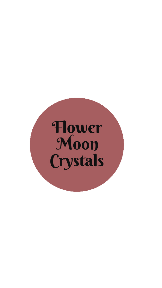 The mood is romantic, aesthetic. Flowers, moons, clouds, crystals